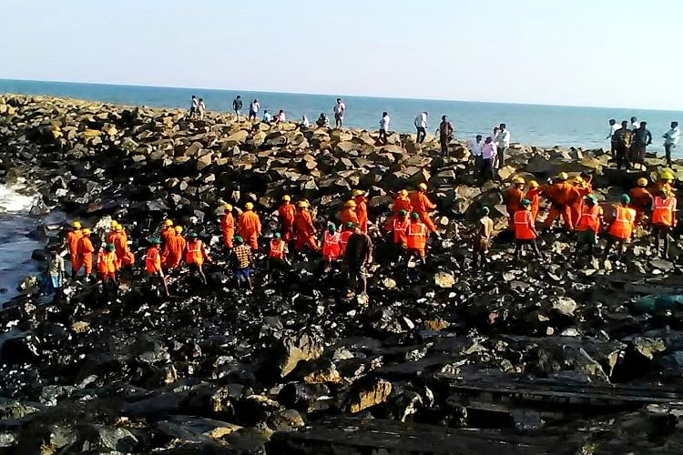 Fishermen, fire personnel, students, NGOs, Coast Guard among others make up the clean-up crew.