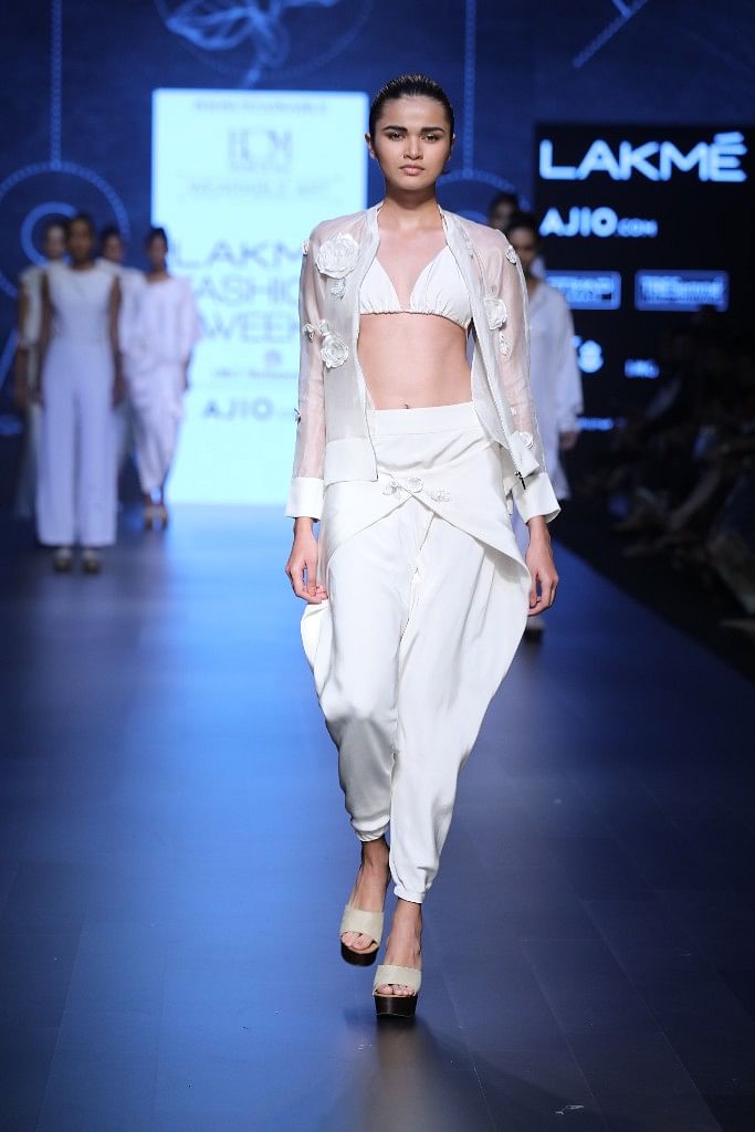 Designers are interpreting the white shirt in different ways: from oversized collars to teaming them with ‘lehengas’