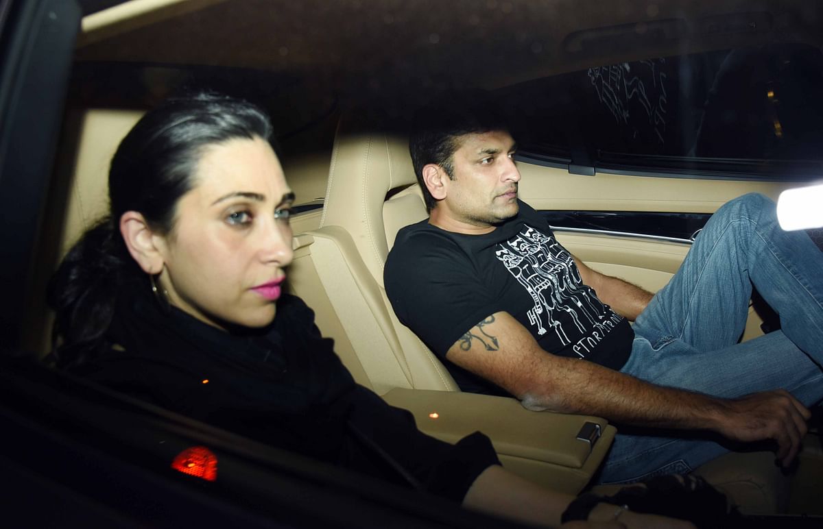 Karisma Kapoor spotted with Sandeep Toshniwal at an event.