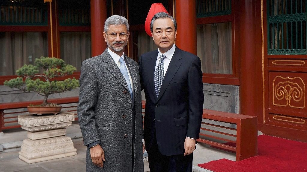 Foreign Secretary S Jaishankar with Chinese Foreign Minister Wang Yi before a meeting in Beijing on Wednesday. (Photo Courtesy: PTI)