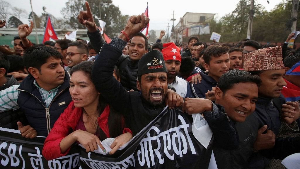 Nepalese students affiliated with the All Nepal National Free Students Union, a student wing of the Communist Party of Nepal Unified Marxist Leninist, protest near the Indian Embassy. (Photo: Reuters)