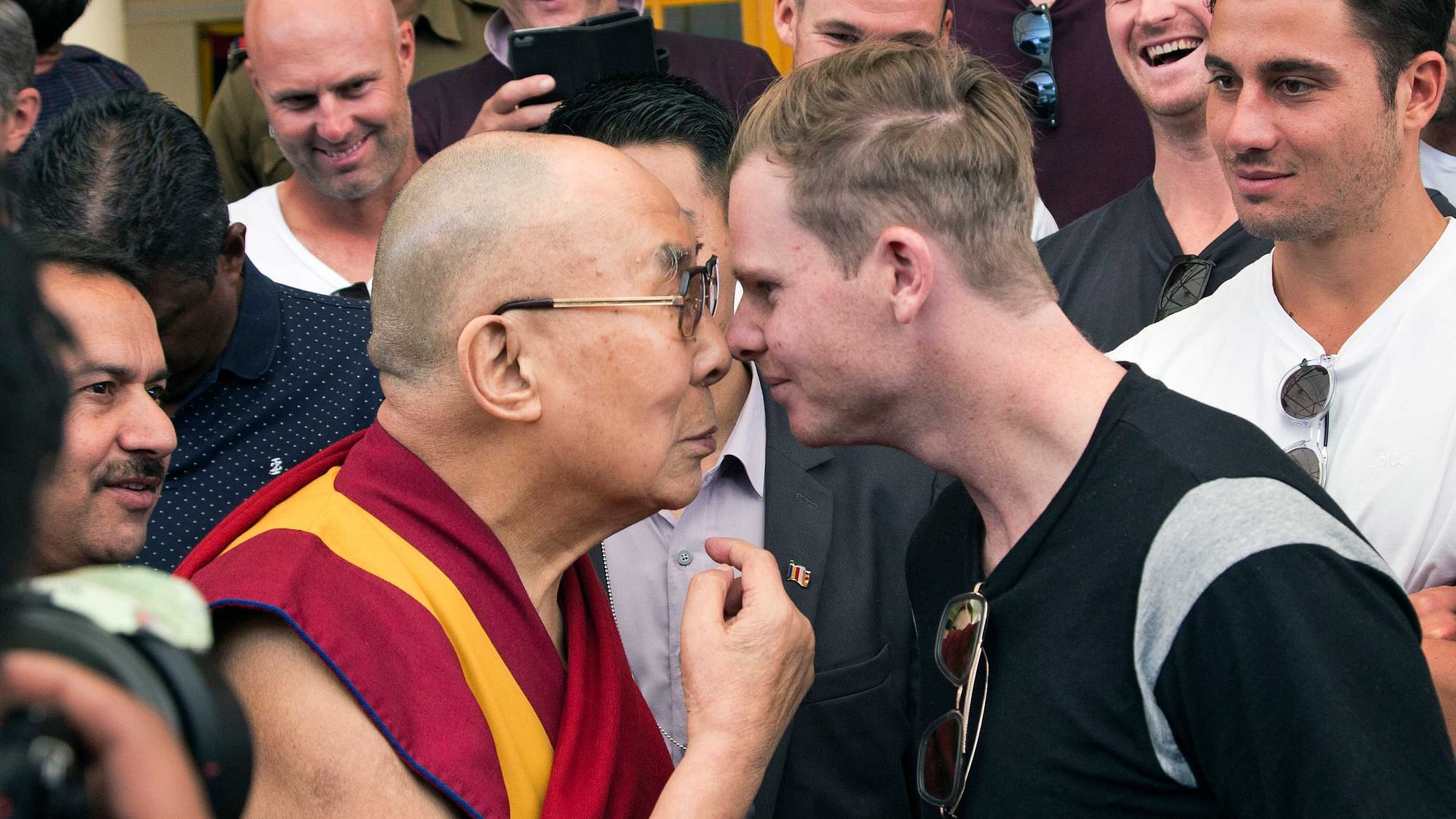 Tibetan spiritual leader the Dalai Lama with Australian captain Steven Smith during an interaction with the team at the Tsuglakhang temple in Dharmsala. (Photo: AP)