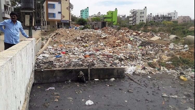 Migrant labourers often use <i>rajakaluve</i> (storm water drain) to defecate for the lack of a proper toilet. (Photo Courtesy: The News Minute)
