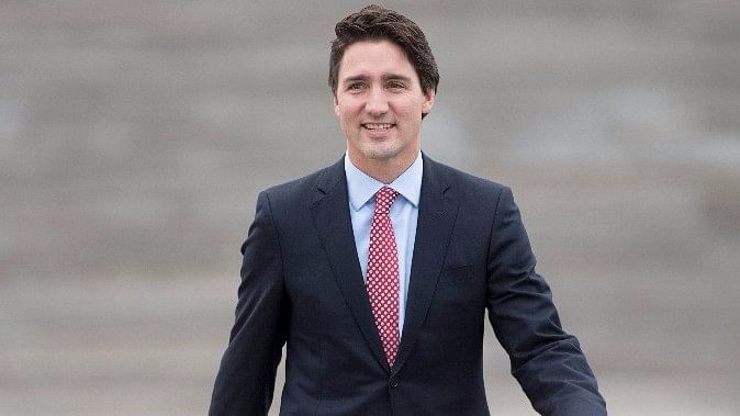 Is Justin Trudeau walking to the Senate or modeling on a ramp? (Photo: AP)