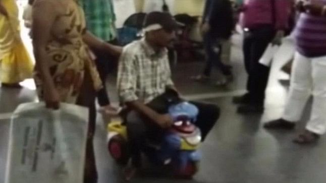 Patient at Gandhi hospital rides a toy cycle. (Photo: ANI Screengrab)