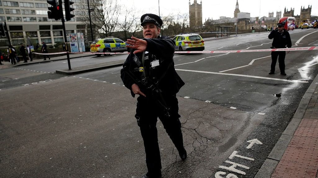 Police secure the area close to the Houses of Parliament in London. (Photo Courtesy: AP)
