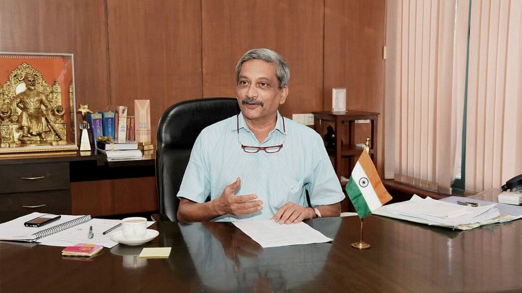 Goa Chief Minister Manohar Parrikar assumes charge of his office in Panaji on Wednesday. (Photo: PTI)