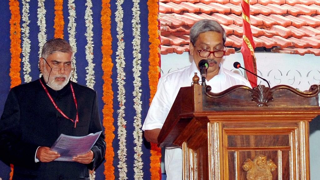  BJP leader Manohar Parrikar taking oath as Goa’s new Chief Minister at a swearing-in ceremony in Panaji on Tuesday. (Photo: PTI)