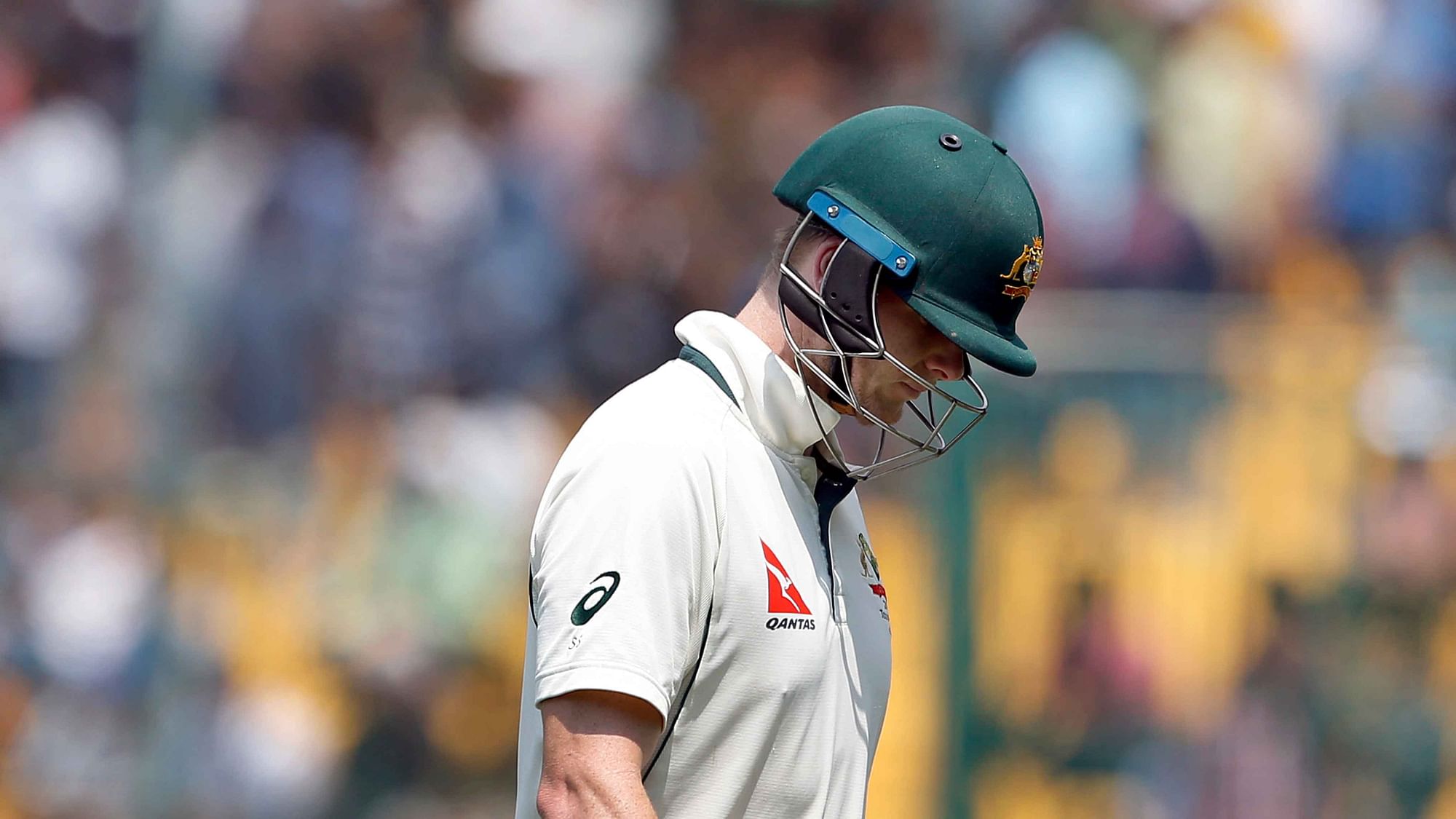 Steve Smith walks back to the pavilion after being given lbw off Umesh Yadav. (Photo: AP)