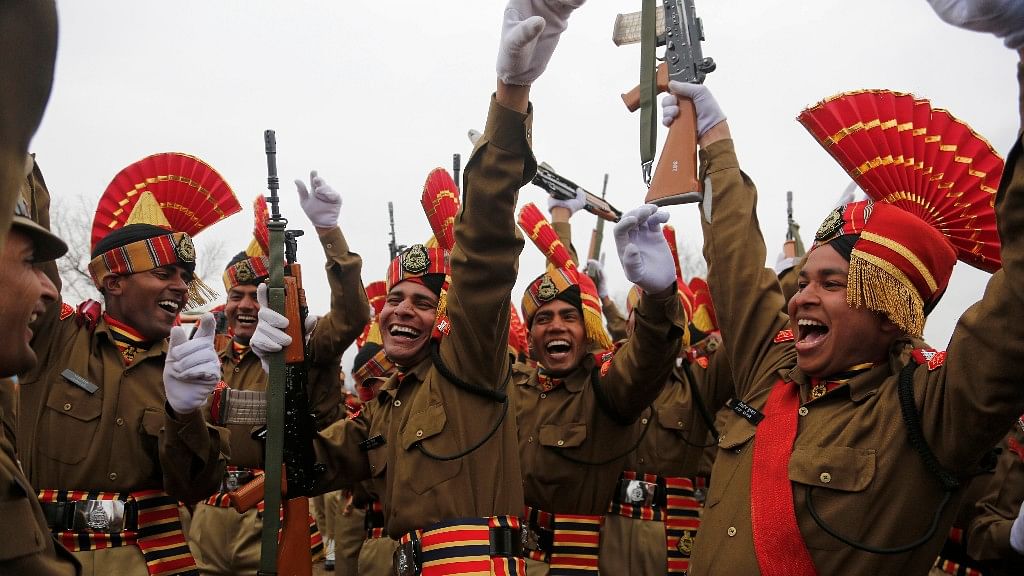 New recruits of the Border Security Force (BSF) dance as they celebrate during passing out parade ceremony in Humhama, on the outskirts of Srinagar. (Photo: AP Photo/Mukhtar Khan) 