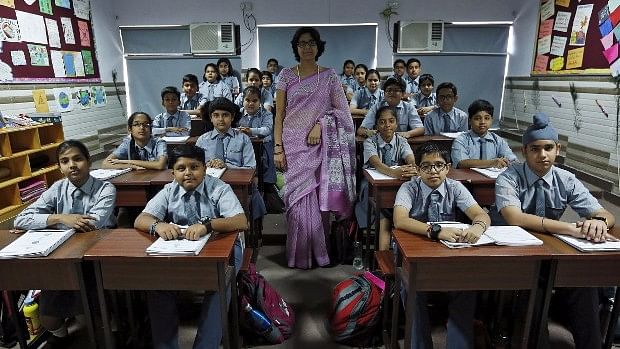 The GST regime is now set to disrupt the status-quo, including educational activities.(Photo: Reuters/Adnan Abidi)
