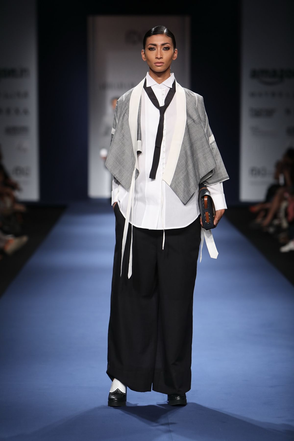 

Ties with kurta and pants were seen at the Abraham and Thakore show presented at Amazon India Fashion Week 2017