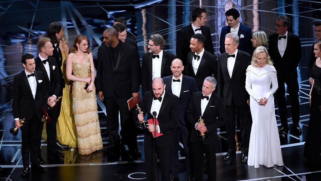 The <i>La La Land</i> team accepts the Academy Award for Best Picture, minutes before it was  snatched away from them. (Photo: AP)
