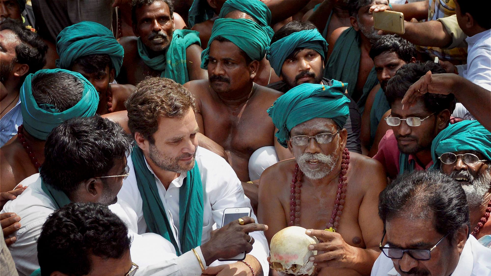  Congress Vice President Rahul Gandhi meeting the Tamil farmers who are agitating for loan waiver and compensation for their crop failure at Jantar Mantar in New Delhi on Friday. (Photo Courtesy: PTI)