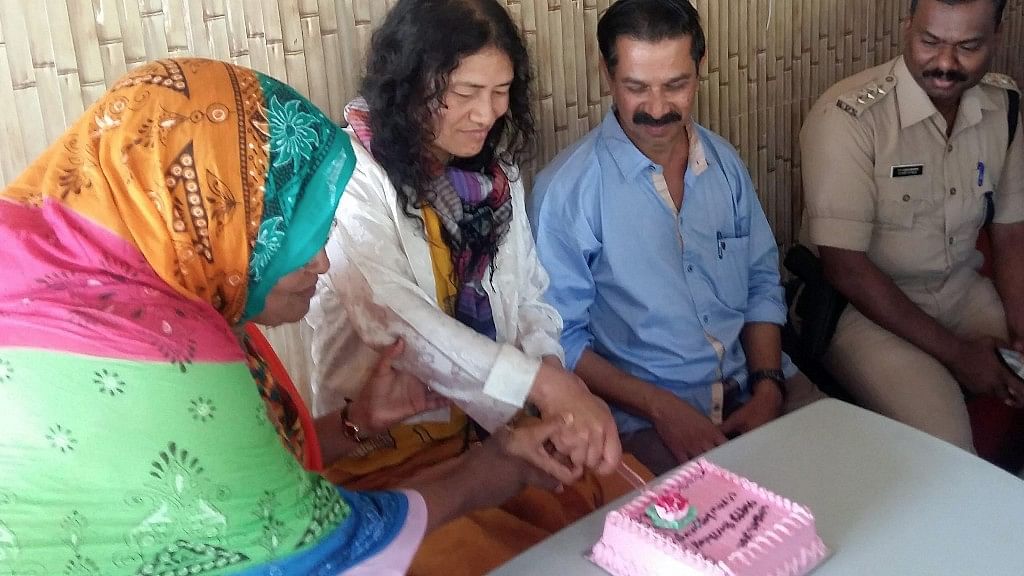 Irom Sharmila arrived in Kerala on her 45th birthday. She cut a cake with friends at the Santhigramam rehabilitation centre in Kerala. (Photo: PTI)