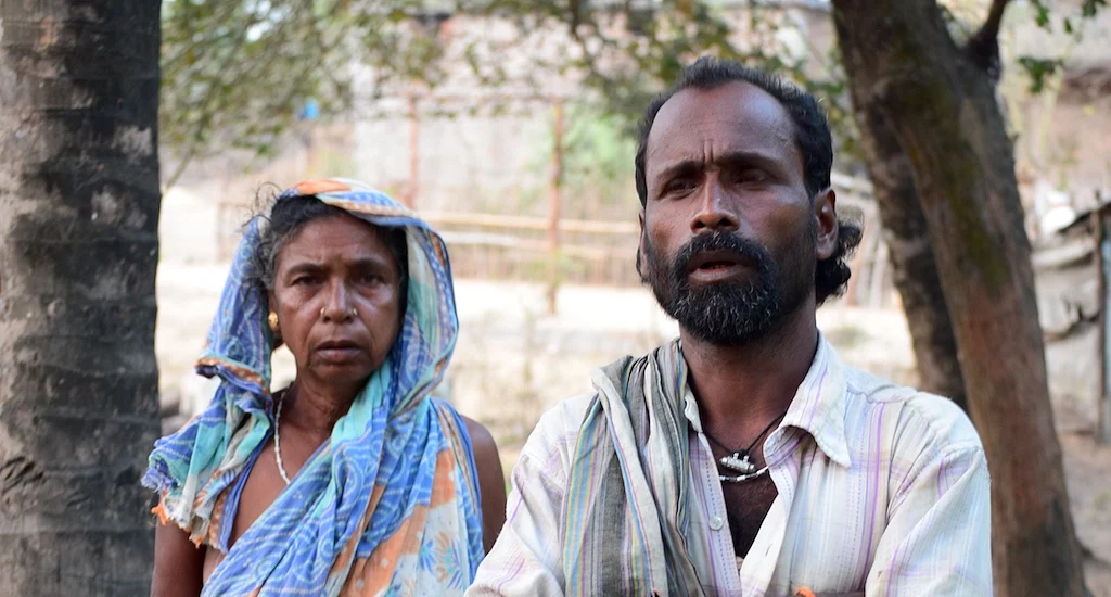 An anguished Gouri Das, seen here with her son Ranjan Das, has lost her land to the now-abandoned steel project. (Photo: The Village Square)