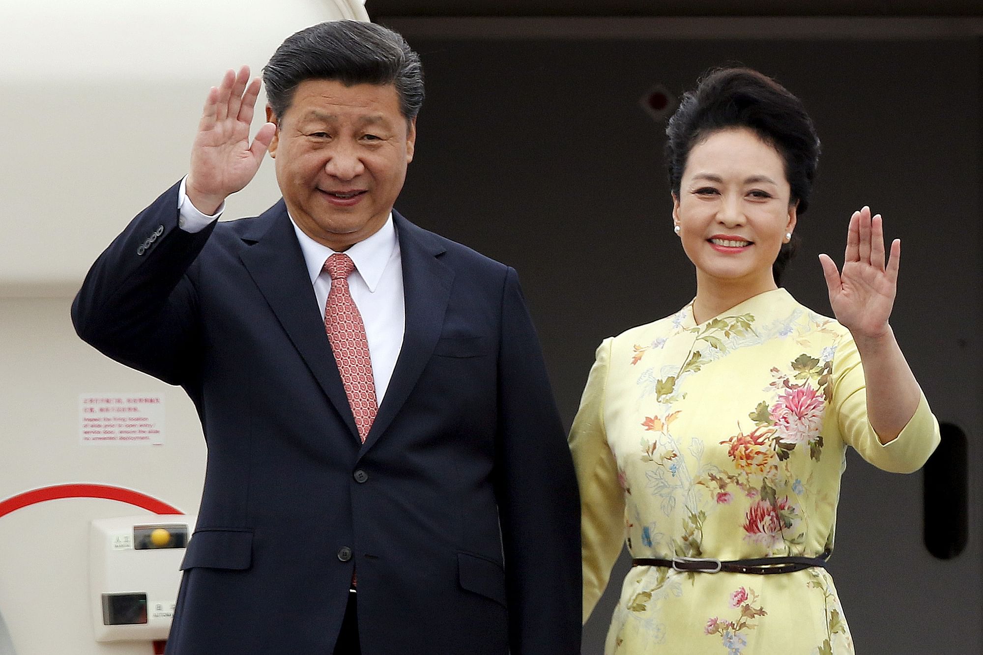 Chinese President Xi Jinping (left) First Lady Peng Liyuan (right) (Photo Courtesy: Reuters)