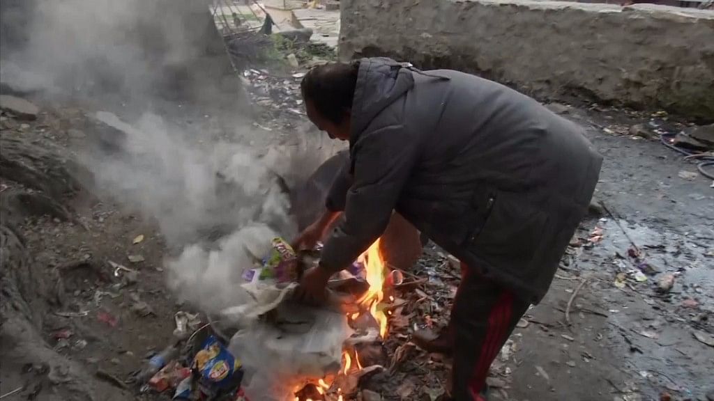 Most residents of Malana village in Himachal Pradesh choose to overlook the toxicity that burning plastic waste brings, and instead, only focus on it as a  replacement for kerosene. (Photo Courtesy: AP Videograb)