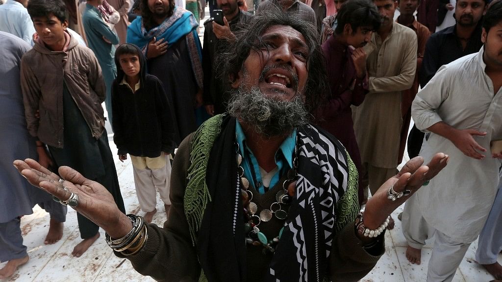 A man mourns the death of a relative who was killed in a suicide blast at Lal Shahbaz Qalandar shrine in Pakistan’s Sindh province. (Photo: Reuters)