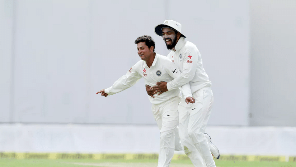Kuldeep Yadav celebrates a wicket with KL Rahul. (Photo: BCCI)