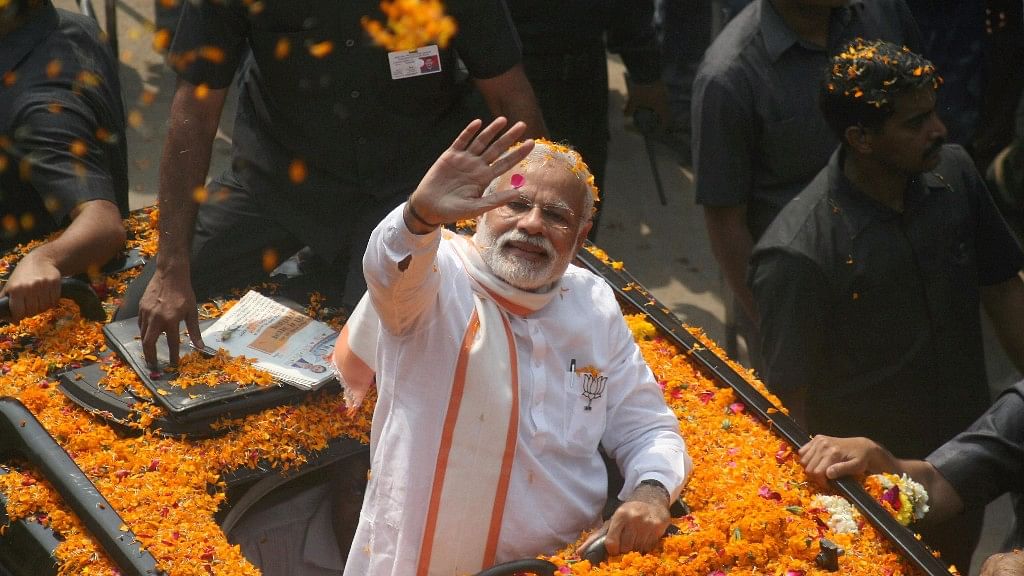 PM Modi during his roadshow in Varanasi.&nbsp;