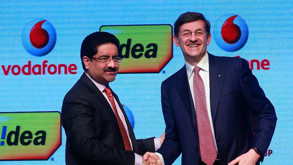 Aditya Birla Group chairman, Kumar Mangalam Birla (Left) and Vodafone Group CEO, Vittorio Colao (right). 