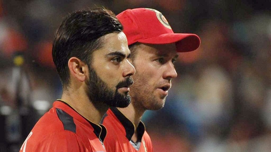 RCB’s Virat Kohli and AB de Villiers may not be seen in the initial few weeks of the IPL. (Photo: IANS)