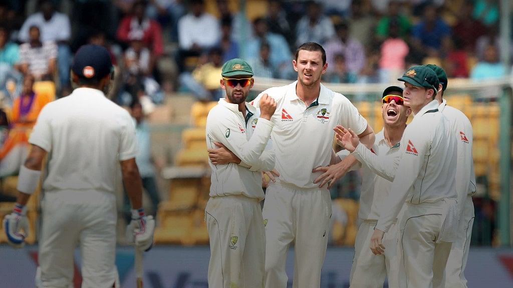 Josh Hazlewood of Australia celebrates the wicket of Virat Kohli captain of India during day three of the second test. (Photo: BCCI)