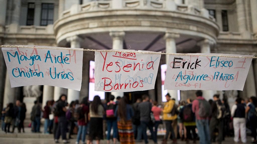 Papers showing the names of 40 girls who died in a fire at a Guatemalan children’s shelter hang outside the Palace of Fine Arts as several dozen people gather to protest in Mexico City on Monday. (Photo Courtesy: AP)