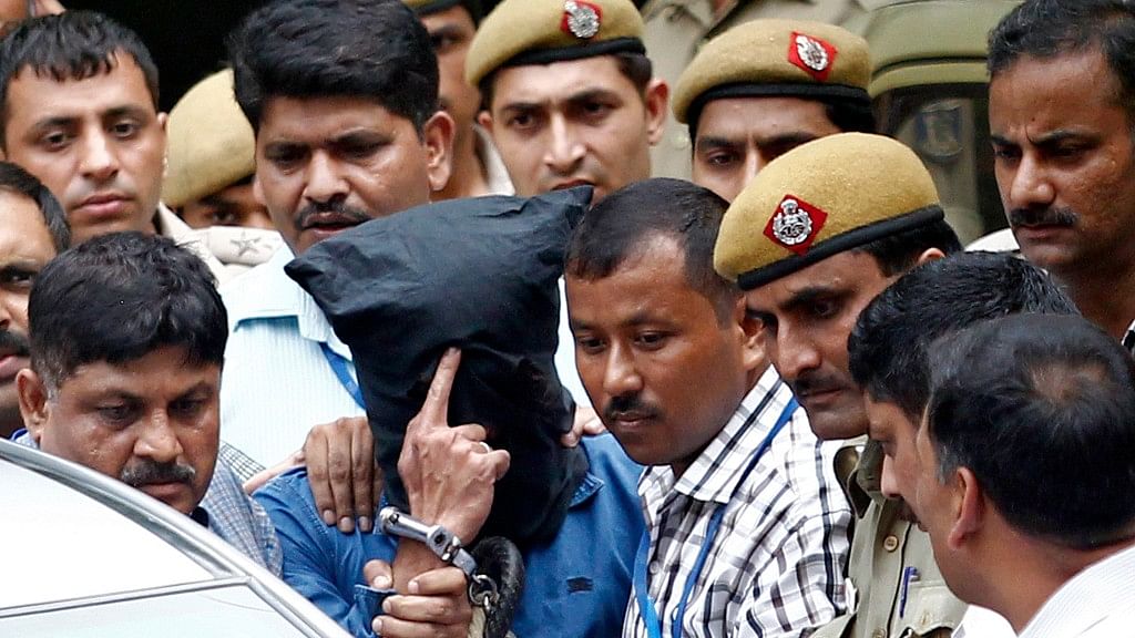 File photo of Indian Mujahideen operative, Yasin Bhatkal, being escorted by the police. (Photo: Reuters) 