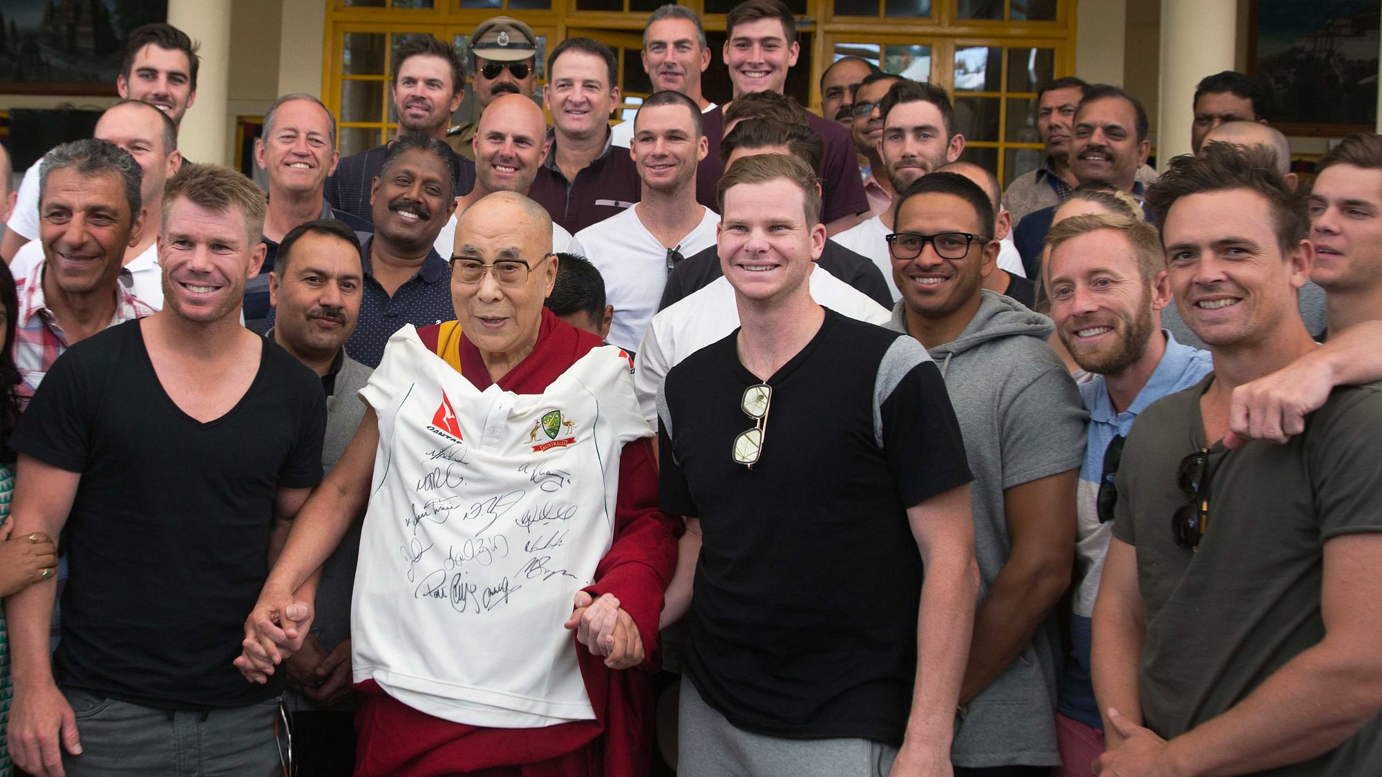 Tibetan spiritual leader the Dalai Lama with the Australian cricket team during an interaction with the team at the Tsuglakhang temple in Dharmsala. (Photo: AP)