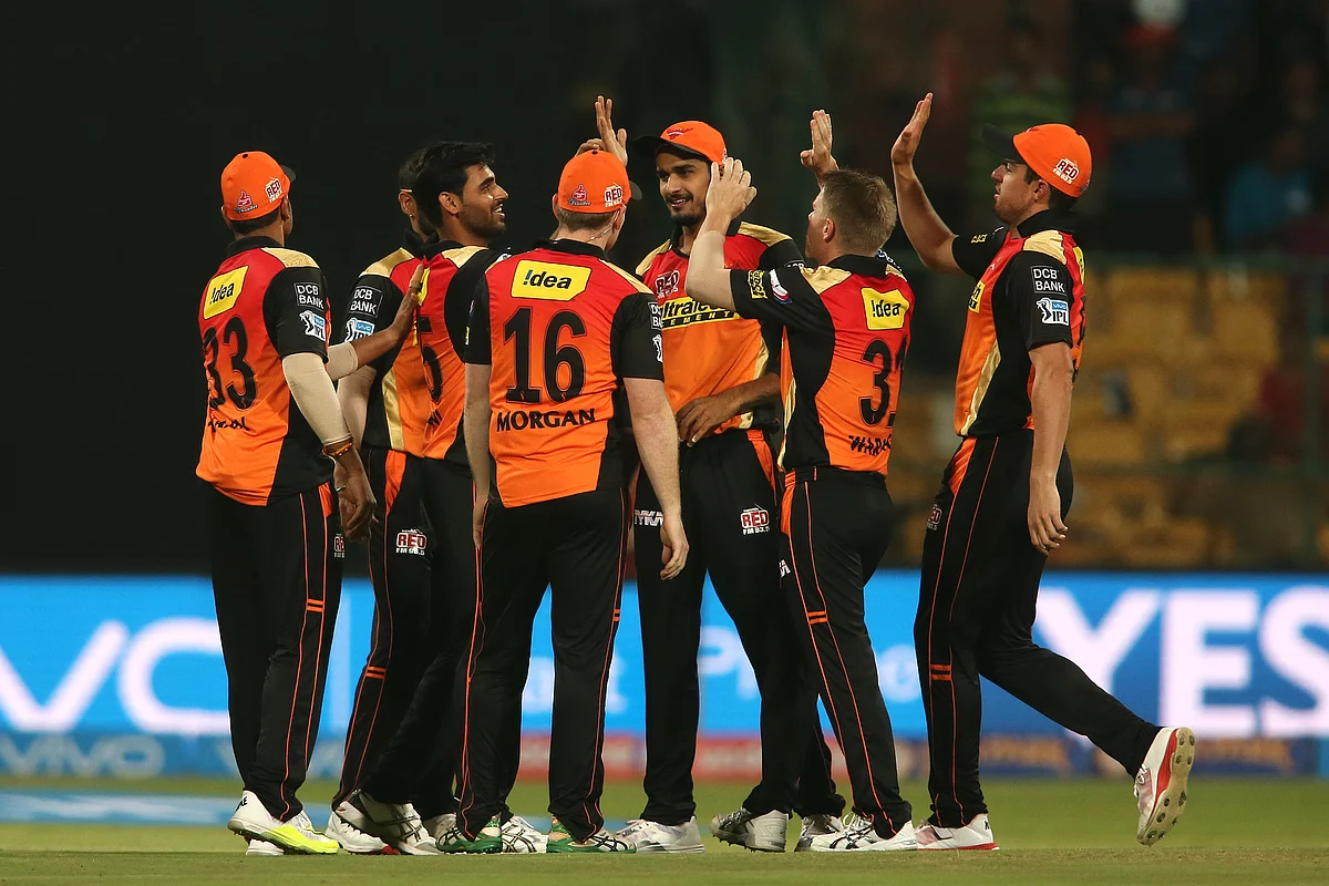 Bhuvneshwar Kumar celebrates with his teammates after picking up a wicket. (Photo: BCCI)