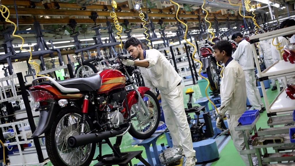 Employees work on an assembly line of Hero Motocorp during a media tour to the newly opened plant in Neemrana. (Photo: Reuters)