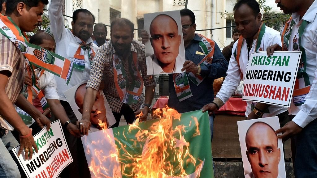 Congress workers protest in Mumbai against Pakistan for sentencing former Indian naval officer Kulbhushan Jadhav to death. (Photo: PTI)
