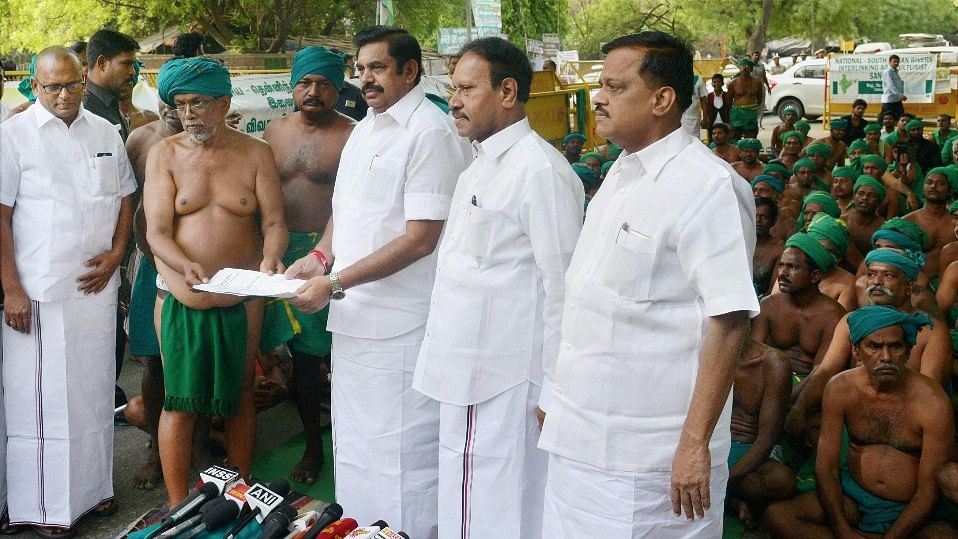 Tamil Nadu Chief Minister Edappadi Palanisamy with the protesting farmers in New Delhi. (Photo: PTI)