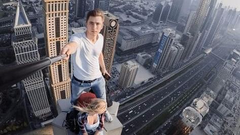 

Dmitri Chernysh with his girlfriend on the top of 60-storey tall Millenium Towers in Dubai. (Photo Courtesy: Instagram/<a href="https://www.instagram.com/p/BSYncUShnL8/?taken-by=dmitriy_chernysh&amp;hl=en">dmitriy_chernysh</a>)