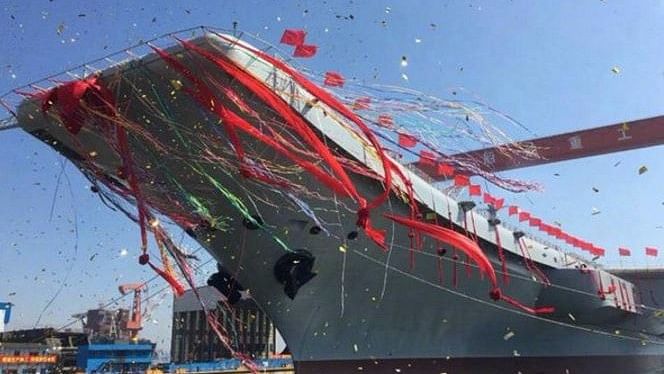 

China celebrates the launch of its first indigenously built aircraft carrier. (Photo Courtesy: Twitter/@<a href="https://twitter.com/chinaorgcn">China.org.cn</a>)