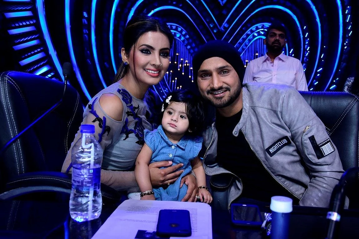 Geeta Basra and Harbhajan Singh pose with their daughter. (Photo courtesy: Star Plus)