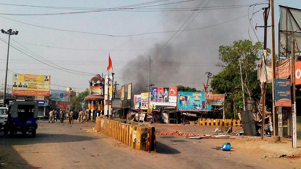 Security personnel patrolling Nawada, Bihar after communal tension were triggered by torn religious posters earlier in April. (Photo: PTI)