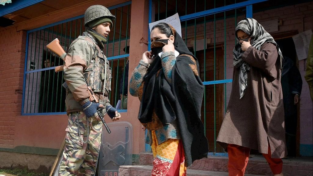 Women coming out from a polling station after casting their vote for Srinagar Parliamentary constituency in Srinagar on Sunday.(Photo: PTI)