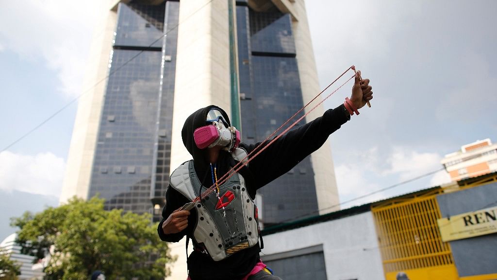 A protestor at the protest in Caracas, Venezuelan (Photo: AP)