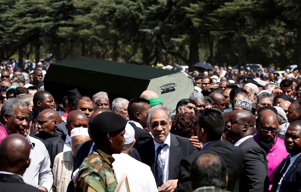 Mourners carry a casket during the funeral of Ahmed Kathrada, who was sentenced to life imprisonment alongside Nelson Mandela, at the Westpark Cemetery in Johannesburg, South Africa on 29 March. (Photo: Reuters)