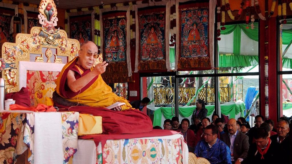  Tibetan spiritual leader Dalai Lama addressing devotees during a spiritual discourse at Yid-Ga-Choezin, in Tawang district of Arunachal Pradesh on Saturday. (Photo: PTI) 