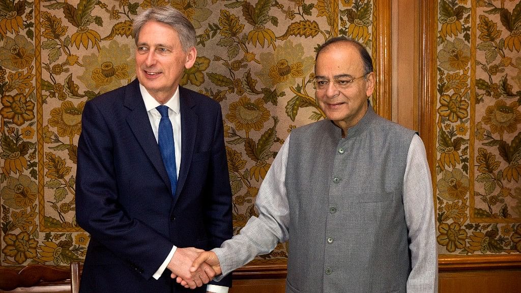 

Britain’s Chancellor of the Exchequer Philip Hammond (left) shakes hand with Finance Minister Arun Jaitley before their delegation level talks in New Delhi. (Photo: AP)