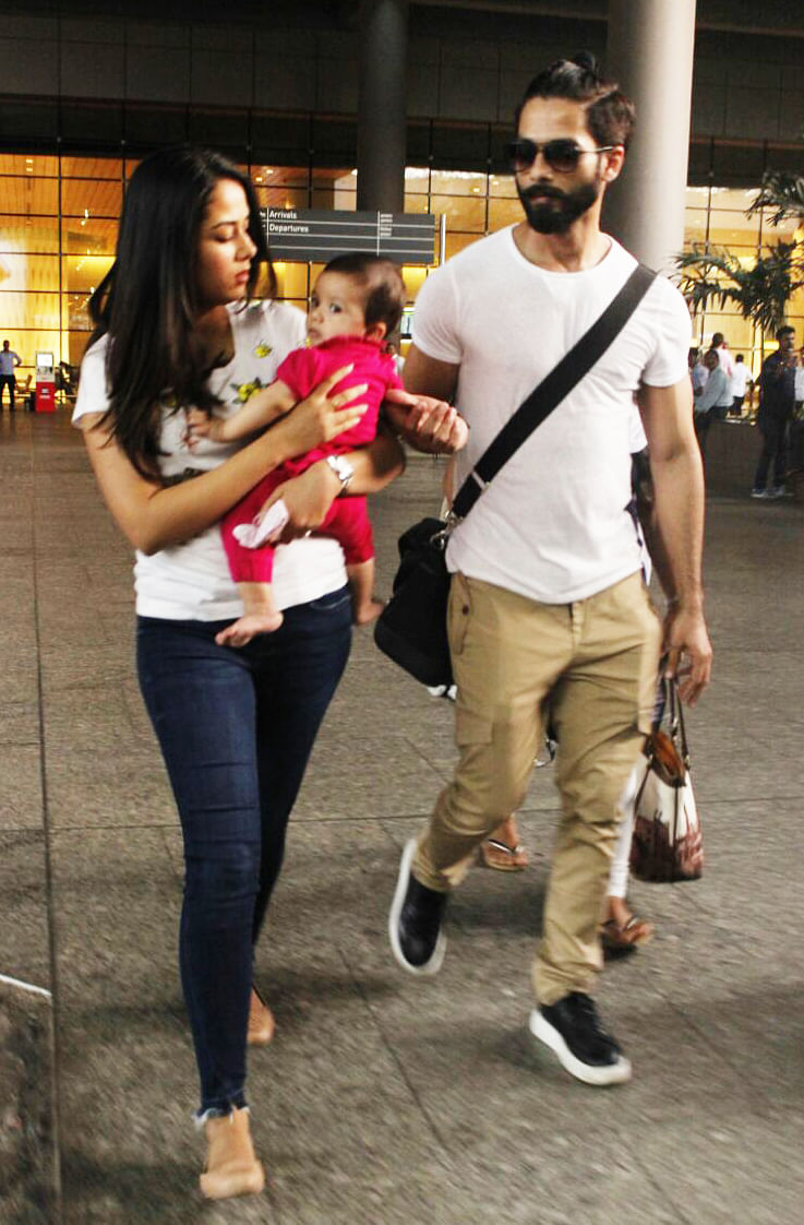 Our shutterbugs spotted Shahid Kapoor with wife Mira and baby Misha at the airport. 