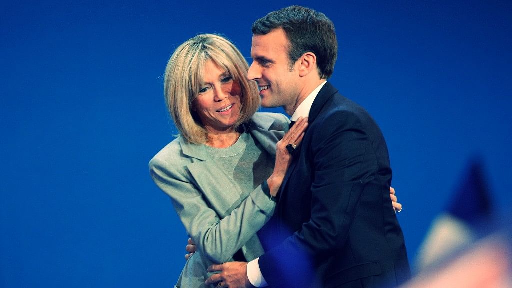 French presidential candidate Emmanuel Macron (R) and his wife Brigitte Macron. (Photo: AP)