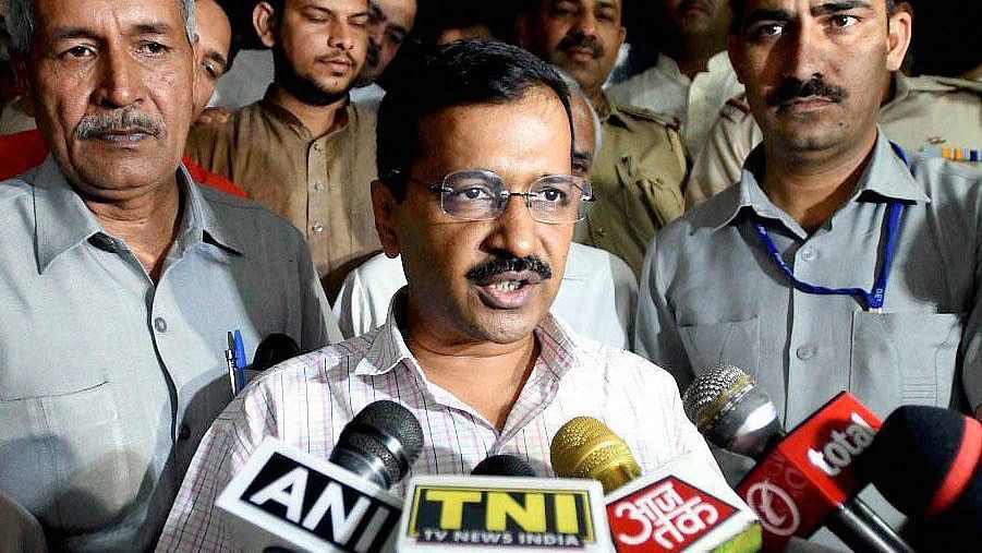  Chief Minister Arvind Kejriwal addressing media after his meeting with Delhi Election Commissioner in New Delhi on Friday. (Photo: PTI)