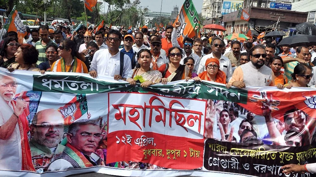 BJP workers stage a demonstration during a protest against West Bengal government in Kolkata, on April 12, 2017. (Photo: IANS)
