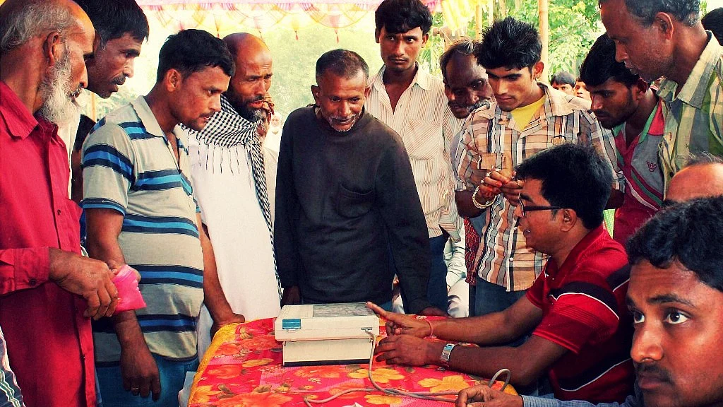 Election Commission officials demonstrating the handling of EVM. Image used for representational purposes. (Photo: PTI)