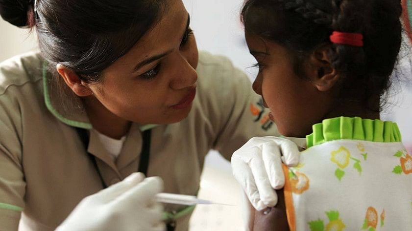 A health worker administers the vaccine to an infant in India. (Photo Courtesy: Facebook/<a href="https://www.facebook.com/itfordevelopment/photos/p.684557041752744/684557041752744/?type=1&amp;opaqueCursor=AbpsPh1XFXG-p90brNM4R-hk_e3uZiMLcZfTpio37ROKVzWx2n3phsmBtE4FSM6y-YiI-DGHGZrRSmicne12oZWWrcqPtamV_Mp3VytSNoaFJ_MzVhXNJVRnuFNOerPN1mzVvKKN9xa6nViL7scDvd4eR2EyGn85HzSSk4X-bReEmglkCNJ2Nym5slhEeDFFdYO3ZuVfqbPqNXm0ja5ulrWnkFBlkPoR99nsO_7GMh7YUNCCkMgAOLTp0xMfRbsltmkPaWLCIEwpF_QZD9q_akyz-OcDHjs_3IRYGyAnASJTCvCN90shDIa6DAI-YbT0iDZyMZcVrfz1xtdUobasMKEANnAxV4PRTtIK93VAfSnl4FBoX6simSm3Yo9FYz9J27YY-qk5ktBndyJqFERX6uef&amp;theater">I.T for Development</a>)
